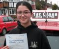 Stephanie with Driving test pass certificate